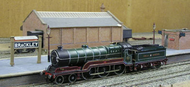 The Livery of John Robinson's Class 1 'City of Manchester' sets the period of the layout.