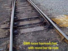 Switches showing round tie bars, note front bar extended through holes in the stock rails to prevent the switches lifting.